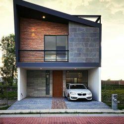 Casa minimalista com estrutura metálica e bloco aparente